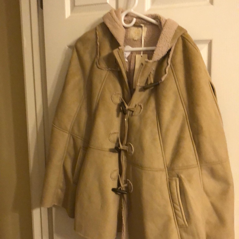 Vest jacket very cute but bought it and never wore it, it's too hot here!